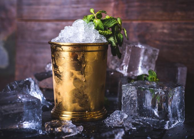 Mint Julep cocktail with ice blocks